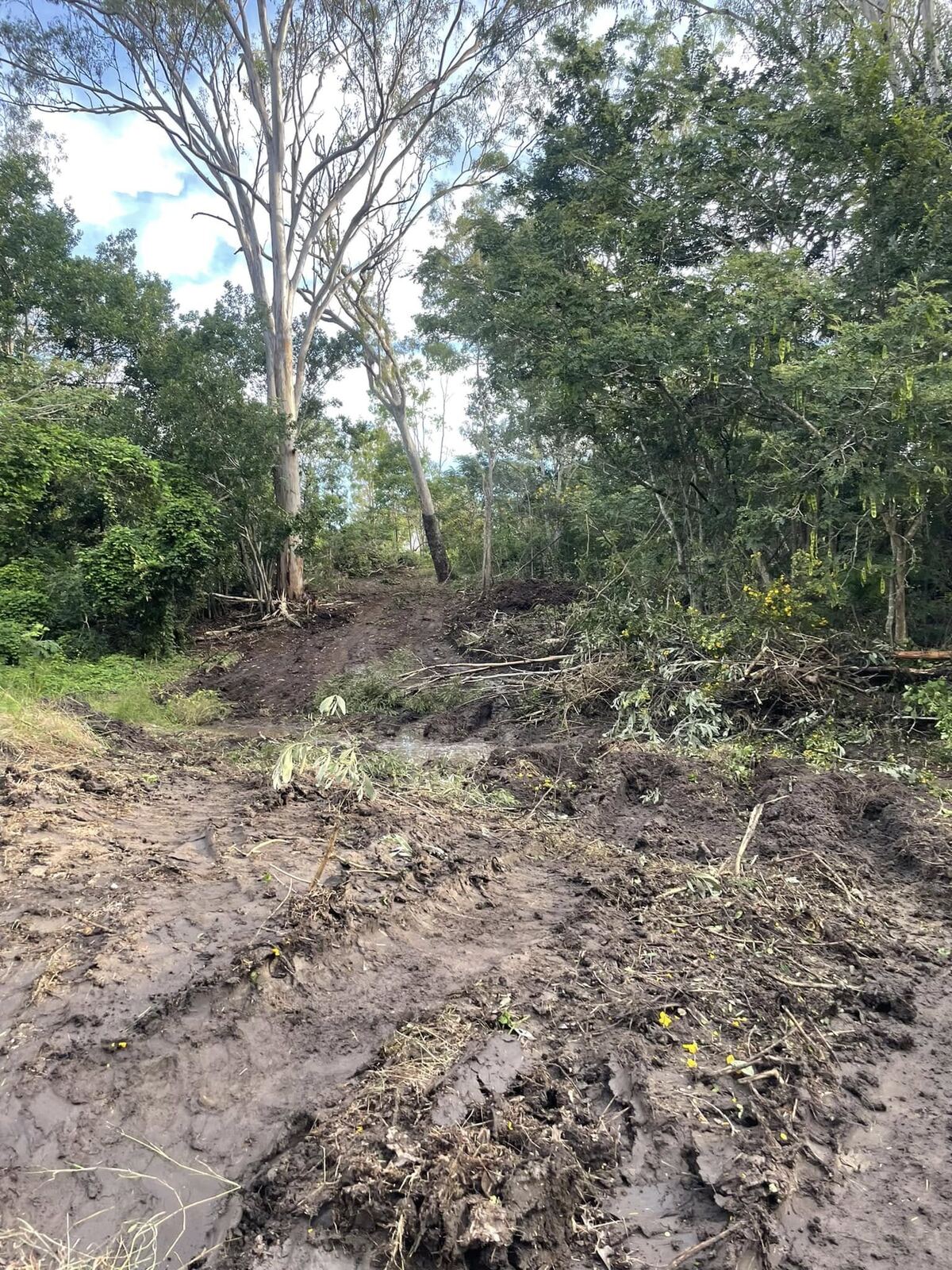 Rough washed-out track before works