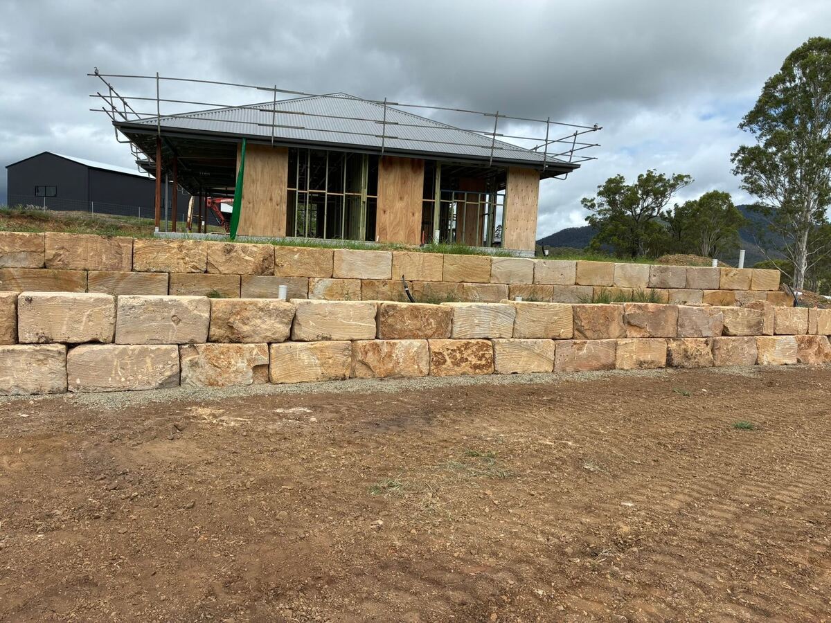 Rock retaining wall at new home